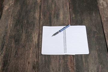 notebook crumpled paper wrinkled blank  white  on the desk, busi