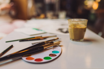 brushes laying on the tabel in cafe