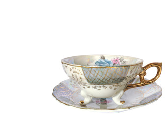 Vintage tea cup, isolated on white. Beautiful porcelain.
