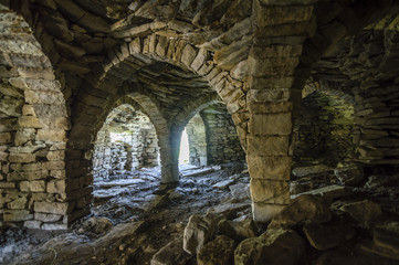Ruins of ancient medieval chechen village near Lake Kezenoyam (Kezenoy Am) in Chechnya, Russia