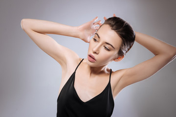 Obraz premium Young model making pictures for her portfolio