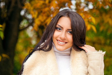 Beautiful arab woman warmly clothed autumn outdoor