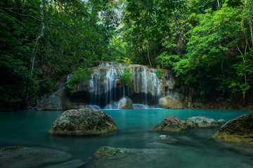 Fototapeta na wymiar Breathtaking green waterfall, Erawan's waterfall, Located Kanchanaburi Province, Thailand