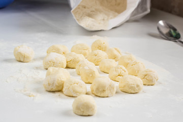 Fototapeta na wymiar Raw dumplings with cottage cheese