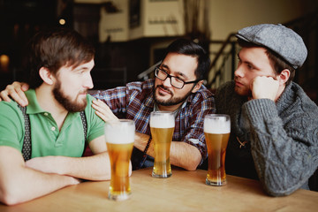 Friends Meeting over Beer in Classy Bar