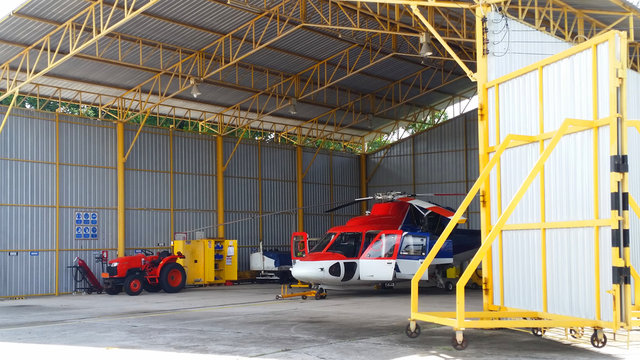 Helicopter of oil and gas industry parked in the hangar 