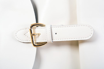 Accessories of a white leather women bag background