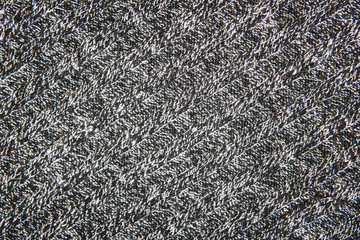 Gray structure of a  knitted woolen fabric background