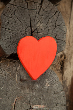 Red heart on a rustic wooden background. St. Valentine's Day