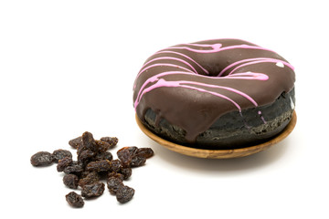 Donut in wooden plate