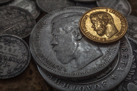 Old coins from silver and gold carry from a shadow of last centuries of the person and feeling of old times