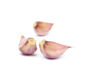 Healthy fresh garlic cloves isolated on white background