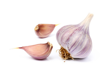 Healthy fresh garlic cloves isolated on white background