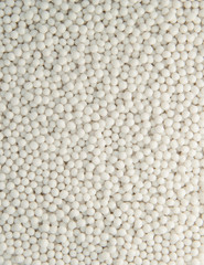 background of small plastic pellets white colored