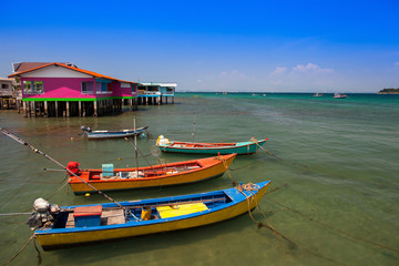 Boat and beach at ocean in Tropicana under clear sky located at south of thailand
