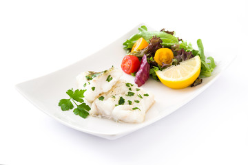 Fried cod fillet and salad in plate isolated on white background
