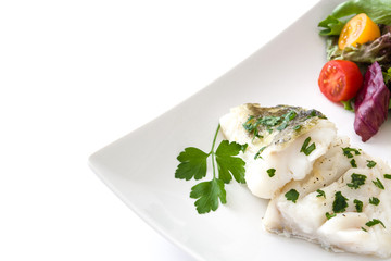 Fried cod fillet and salad in plate isolated on white background
