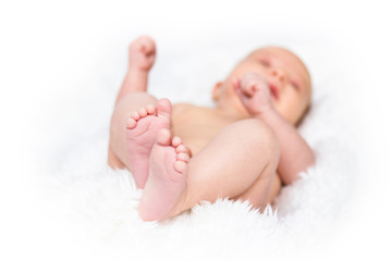 Feet of baby in focus