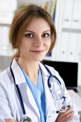 Female medicine doctor at her office