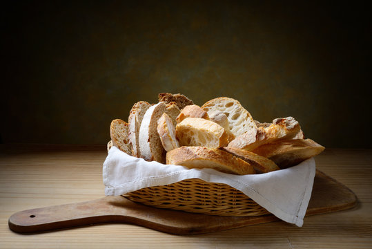 Basket of assorted bread slices. closeup, space for text.