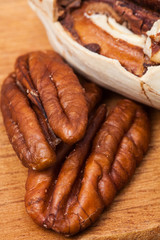 Brown pecans. Nuts. Tasty and healthy food. For your design.