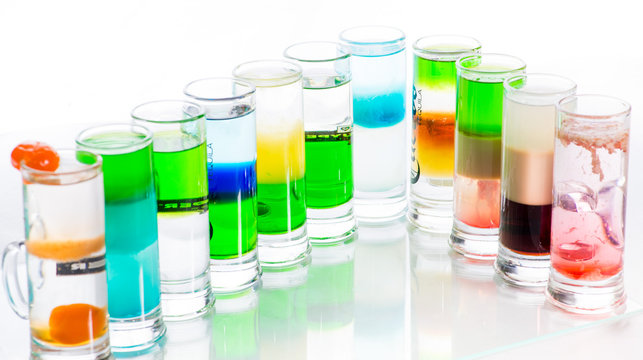 shots of colored layers of different alcohol