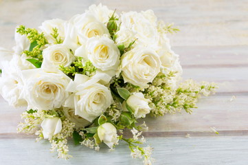 bouquet of white roses on a table