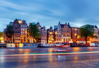 Fototapeta na wymiar Amsterdam. City Canal at dawn.