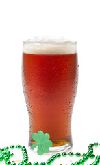 Beer in a Pint Glass with Beads and Clover