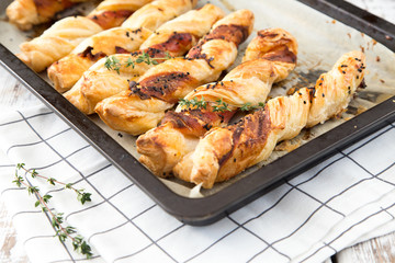 Bacon sticks pastry with black sesame and thyme