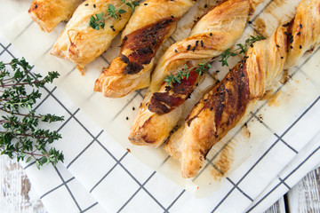 Bacon sticks pastry with black sesame and thyme