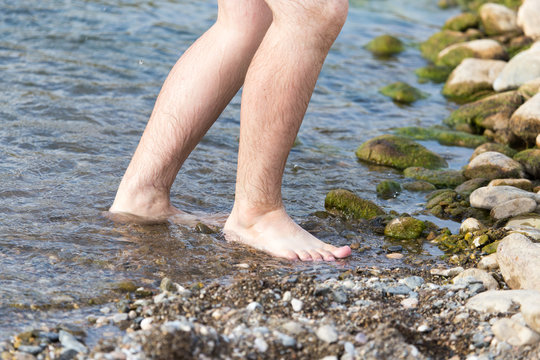 male legs in water
