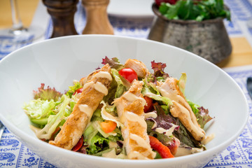 Grilled Chicken Caesar Salad with Cheese and Croutons