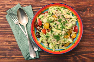 Low carbs Tuna Avocado Salad in glass bowl.