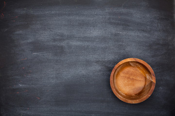 A wooden bowl. Preparing for dinner. For your design.