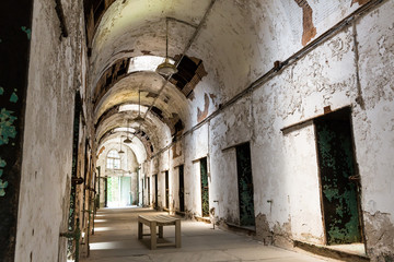 Jail hallway with locked doors.