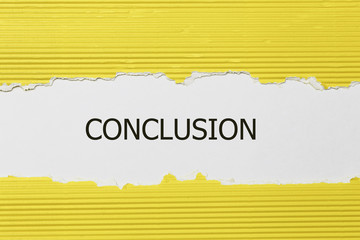 The text conclusion appearing behind torn paper