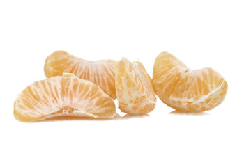 Mandarin or Tangerine fruit with leaves on a white background