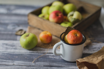Apple on wooden board outdoors
