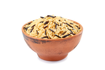 Brown and black rice in ceramic bowl on white