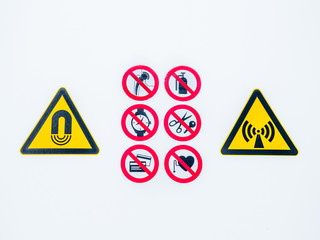 Isolated Warning caution signs at the entrance to the controlled radioactive area lightbox in...