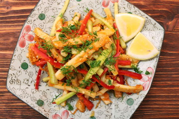 Seafood salad with squid and vegetables