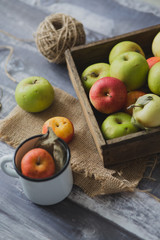 Apple on wooden board outdoors