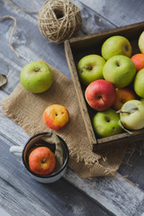Apple on wooden board outdoors