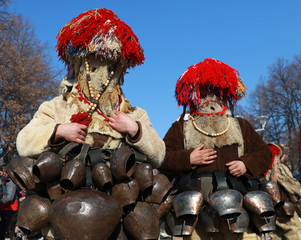 Pernik, Bulgaria - January 28, 2017: Masquerade festival Surva in Pernik, Bulgaria. People with mask called Kukeri dance and perform to scare the evil spirits.