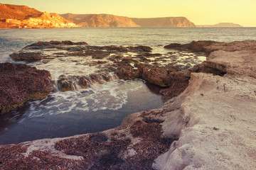 Fototapeta na wymiar Sunrise on the beach Playazo in the Natural Park of Cabo de Gata, Almeria, Spain