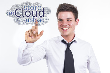Virtual Cloud - Young businessman touching word cloud