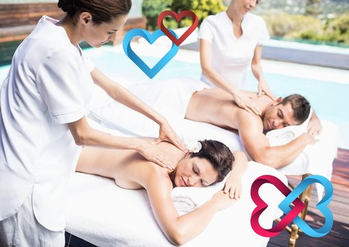 Composite image of couple receiving massage at spa