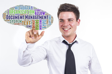 Document Management - Young businessman touching word cloud