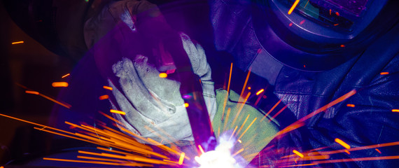 Industrial steel welder in factory technical,